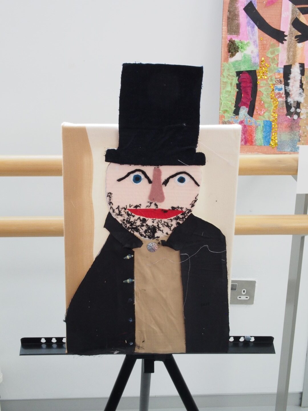 mixed media, figure wearing top hat