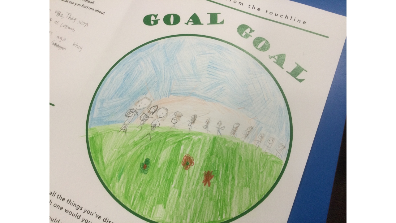 GOAL GOAL and a line of pencil figures advancing across a green pitch under a blue sky